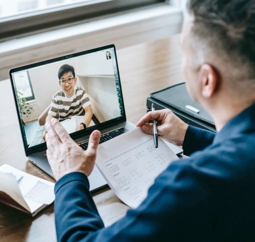 two people talking in a video meeting